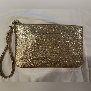 Gold wristlet with USB charger